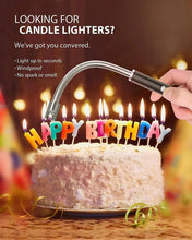 Black arc lighter held above a birthday cake with many lit candles and LED indicator
