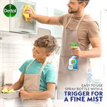 Dettol surface cleanser spray bottle held in hand, green trigger, 500 ml