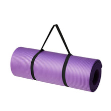 Purple yoga mat rolled up with black carrying strap, textured surface