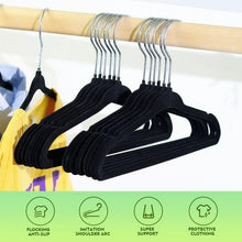 Set of black velvet kids hangers on chrome hooks with ribbed non-slip surface