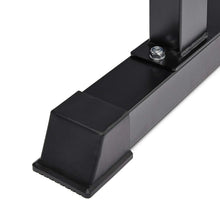 Black exercise bench frame with padded seat and end stabilizer blocks