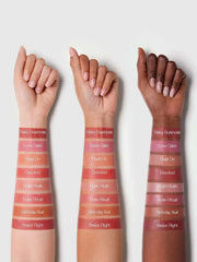 Hand and arm swatches of liquid blush in pink and warm rosy shades