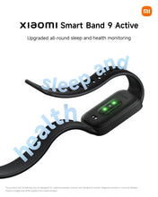 Black fitness tracker with screen on a diagonal view and green indicator lights