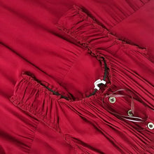 Red V-neck tiered dress with ruched trim and button placket detail