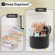 Rotating desk pencil holder with ribbed black base holding pens, markers, and scissors