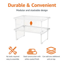 White stackable metal storage shelf set with two slatted levels and corner supports