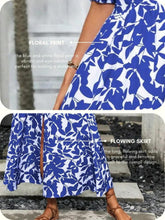 Blue and white floral print maxi dress with flowing tiered skirt and V-neck