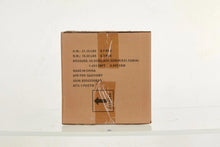Brown shipping box back panel with printed shipping text and label
