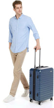 Navy polycarbonate 24in spinner luggage with TSA lock, four wheels and handle