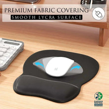 Black mouse pad with smooth fabric cover over integrated gel wrist cushion