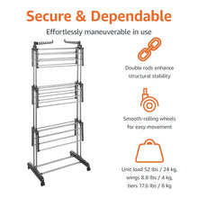 Indoor clothes dryer tower with hanging rod hooks, three wire shelves, and rolling casters.