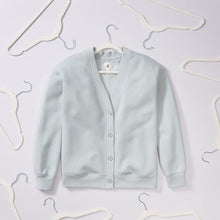 Light blue cardigan on a white clothes hanger with curved shoulders