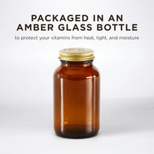Amber glass bottle with gold cap for B-complex vegetable capsules