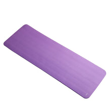 Purple yoga mat laid flat, textured non-slip surface