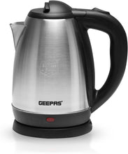Stainless electric tea kettle with black handle and spout, lid closed