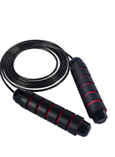 Black and red steel wire skipping rope with padded grip handles