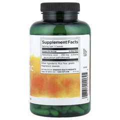 Swanson Pantothenic acid supplement bottle with Supplement Facts label, green capsules