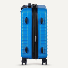 Blue hardside spinner suitcase with textured shell and black center zipper seam