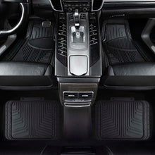 Set of black rubber car floor mats with molded channels for front seating