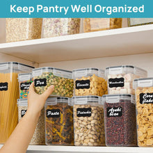 Clear plastic airtight food storage containers with snap lids and labeled contents