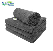 Grey microfiber towels rolled stack with Softspun logo tag