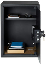 Black electronic safe interior with keypad lock and document storage shelf