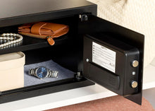Black security safe open with jewelry items on the base and door secured