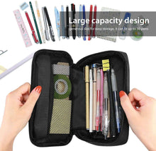 Black pencil bag opened, showing mesh divider and multiple pens inside