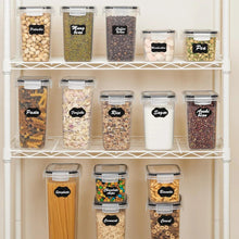 Set of clear plastic airtight food storage containers with snap lids on shelf