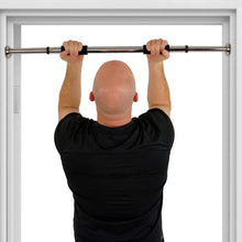 Doorway pull-up bar with black foam grips across a doorway