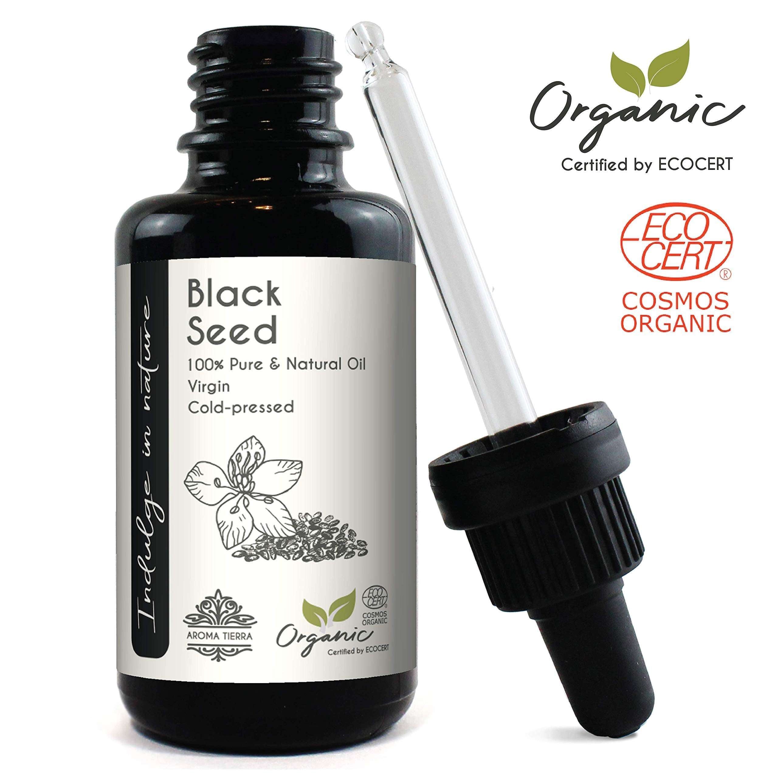 Black glass bottle and dropper of organic black seed oil for hair growth from Aroma Tierra Store
