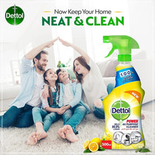Dettol all-purpose cleaner spray bottle with lemon scent, shown beside a family
