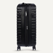 Black hard-sided spinner suitcase with vertical zipper and four multi-direction wheels