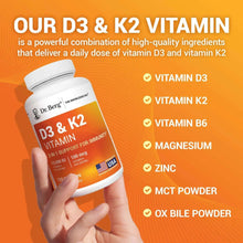 Hand holding white D3 & K2 vitamin supplement bottle with orange label