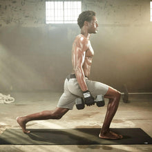 Manduka X yoga mat in use, purple surface under kneeling person