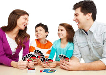 UNO card game group with deck and card hands laid out on a table
