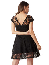 Black lace bodycon knee-length dress back view with open-back neckline