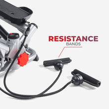 Mini exercise stepper with resistance bands and black foam foot handles