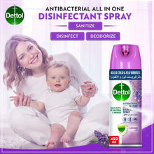 Dettol lavender disinfectant spray bottle next to baby and parent, 450 ml