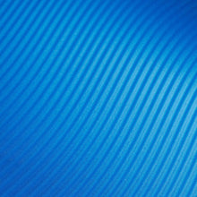 Blue textured yoga mat surface with ribbed pattern