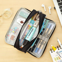 3-compartment black pencil pouch open with pens and markers in mesh inner pockets