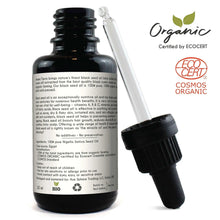 Organic black seed oil bottle with glass dropper and label details