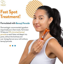 AcneFree Terminator 10 spot treatment cream in orange tube held by a person