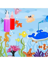 Ocean water art kit with squeeze paint bottles and sea animal wall illustration