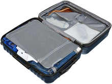 Navy polycarbonate spinner luggage open with mesh divider and interior straps