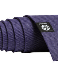 Manduka X yoga mat, purple textured grip with corner logo tag