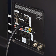 HDMI cable connected to device ports with gold connector ends visible