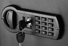 Keypad lock with keys attached on a black security safe door