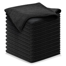 Stack of dark charcoal microfiber cleaning cloths, folded and neatly layered