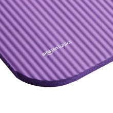Purple yoga mat edge with cushioned thickness and textured grip ridges